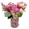 Pink and white mixed bouquet in a burlap-wrapped vase with butterfly decorations