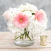 This soft and beautiful arrangement would look perfect on anyone's table or