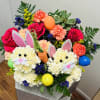 Colorful bouquet with roses, carnations, and bunny decorations