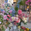 A lush, garden-style centerpiece that reads like a spring celebration-perfect as a