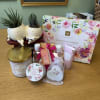 Gift set with two small potted succulents and floral bath products