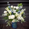 A serene wash of white and blue creates a calming first impression-perfect