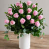 A timeless and elegant arrangement of soft pink roses, thoughtfully designed in