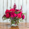 Experience the vibrant beauty of our Rancho Rhapsody Bouquet, a stunning arrangement