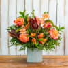 Send warmth and sophistication with the Copper Charm Flower Cube, a unique
