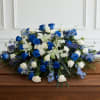 Celebrate a beautiful life with our Heavenly Blue &amp; White Casket Spray