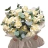 Bouquet of 25 French roses and green eucalyptus.

