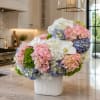 A breathtaking arrangement designed to make a lasting impression. Hydrangea Cloud features