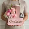 Pink floral graduation gift box with roses, tulips, and carnations