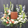 Honor a beautiful life with our "Heavenly Garden Memorial Cremation Tribute" This