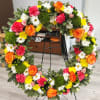 Celebrate a life lived with joy and color. The Radiant Tribute Wreath