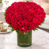 Large bouquet of red roses in a glass vase