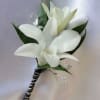 White calla lily boutonniere with black-and-silver wrapped stem