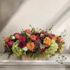 Mixed bouquet of roses and hydrangeas in a wooden box