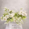 A fresh and elegant garden-style arrangement designed with premium seasonal flowers in