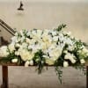 Full Casket 
Flowers: white hydrangea, ivory roses, white phalaenopsis orchids , and