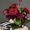 Deep, romantic reds and plum tones are tucked into a glossy ceramic