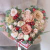A white heart box in peach and blush: garden roses, spray roses