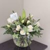 The "Peaceful Remembrance Bouquet" is a serene and elegant arrangement designed to