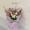 Behind the Clouds is a lovely pink bouquet designed to brighten any