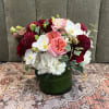 A lush, jewel-toned rounded arrangement designed to make her feel truly celebrated-perfect