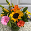 Sunflowers(Seasonal) , Calla-Lilies / Dahlia, Gerbera Daisies, Roses,  Wildflowers, Assorted Fancy