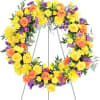 Colorful floral wreath on a standing easel