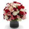 A lush, rounded rose bouquet that reads as pure romance - dense