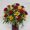 Select this beautiful arrangement of a dozen red roses, sunflowers, and chamomile.

Roughly