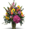 Autumn Aura is a vibrant arrangement standing about 36 inches tall, 18