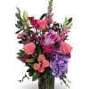 Select this bright and cheery arrangement that includes lilies, roses, and hydrangea!