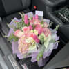 A beautifully curated bouquet designed to brighten any moment. Crafted with premium