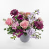 Lavenders and purples. 
Roses, Snapdragons, Stocks and Carnations are main players in