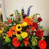 Bright mixed bouquet with roses, lilies, gerbera daisies, and snapdragons