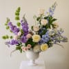 A striking, large-scale arrangement designed for moments that deserve presence. The English