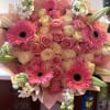 Pink and cream rose bouquet with hot pink gerbera daisies and lilies