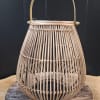 This beautiful rattan 10" lantern is a gift-ready centerpiece
Dimensions:  9" x