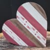 This adorable wooden heart brings a fun touch to home decor.
Dimensions: 