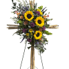 This peaceful arrangement is comprised of a bamboo cross with sunflowers, chrysanthemums