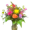 Mix of bright roses, chrysanthemums, snapdragons and colorful accent flowers
