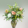 Elegant bouquet with peach and white flowers.