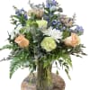 Garden-style bouquet: peach roses, white daisies, pale green carnations with airy foliage