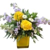 Bouquet of yellow roses, lavender stock, and white snapdragons arranged in a