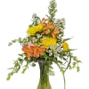 This bright yellow and orange bouquet brings the beauty of the sunrise