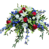 Classy arrangement of white lilies, red roses, and blue delphinium 