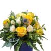 This cheerful arrangement of yellow flowers is sure to brighten someone's day.