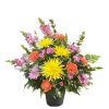 Bright sympathy arrangement with yellow, orange, and purple flowers