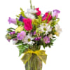 Adorable mix of pink roses, purple stock, and yellow carnations
