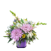 Beautiful mix of lavendar, pink, blue and white flowers.