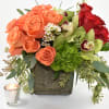 This arrangement comes in a square rustic vase
with Ecuadorian roses in the